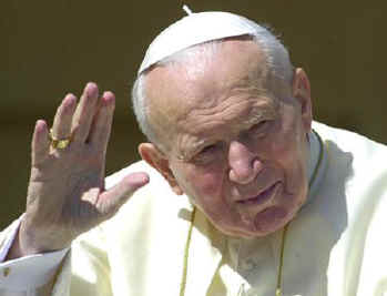 Paus Johannes Paulus tijdens de Algemene Audiëntie van woensdag 15 mei 2002 (AP Foto)